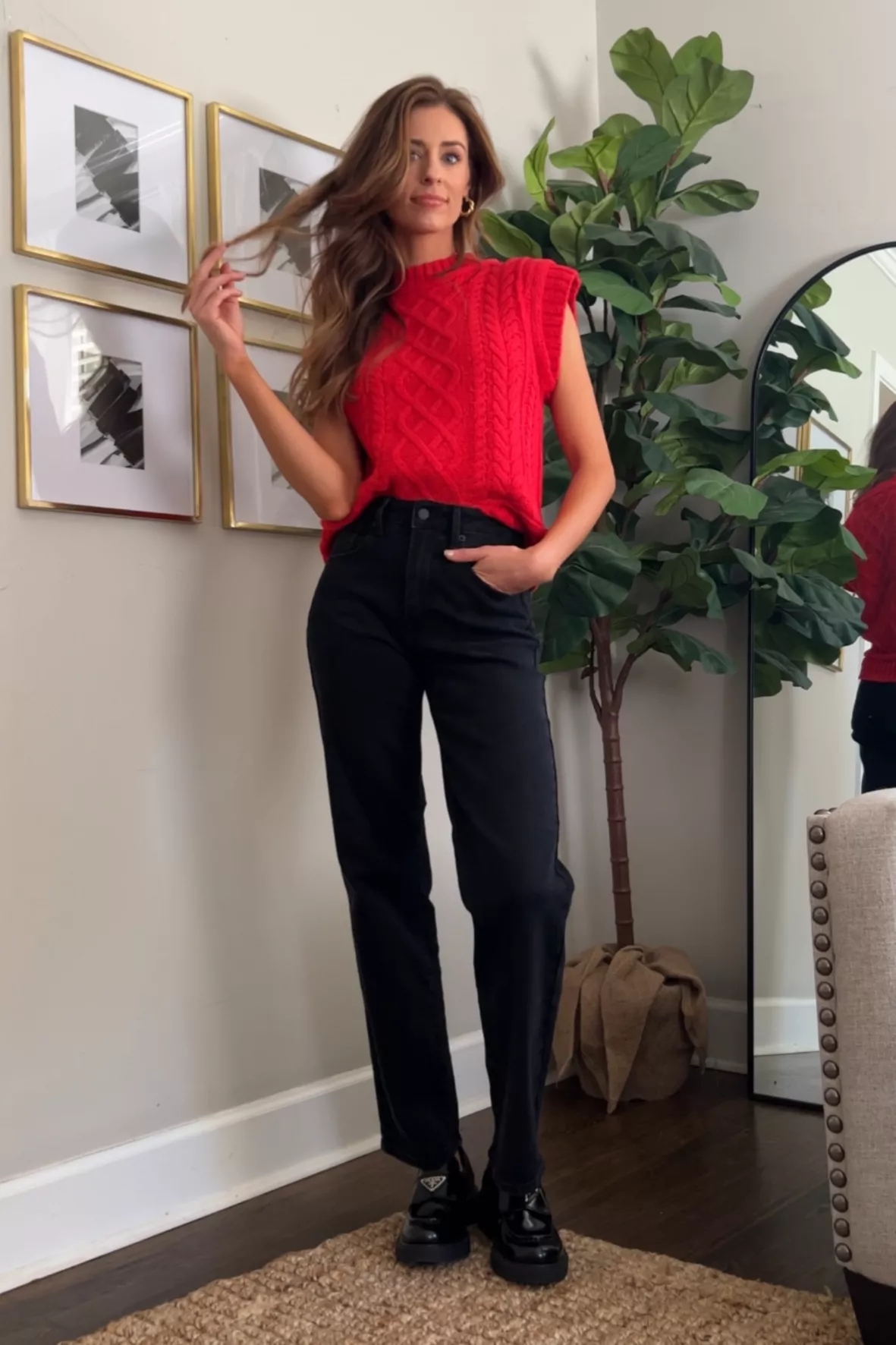 How to style a red and black sweater vest with black shirt? Get this trendy look!