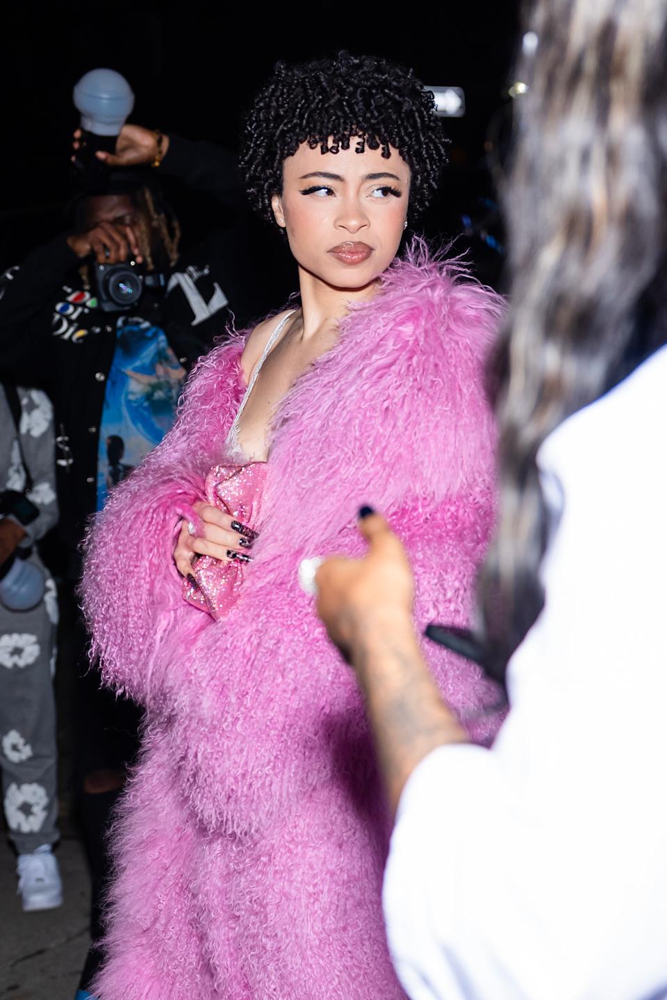 How stunning does Ice Spice look in pink? See the rappers amazing style evolution featuring her favorite color trend.