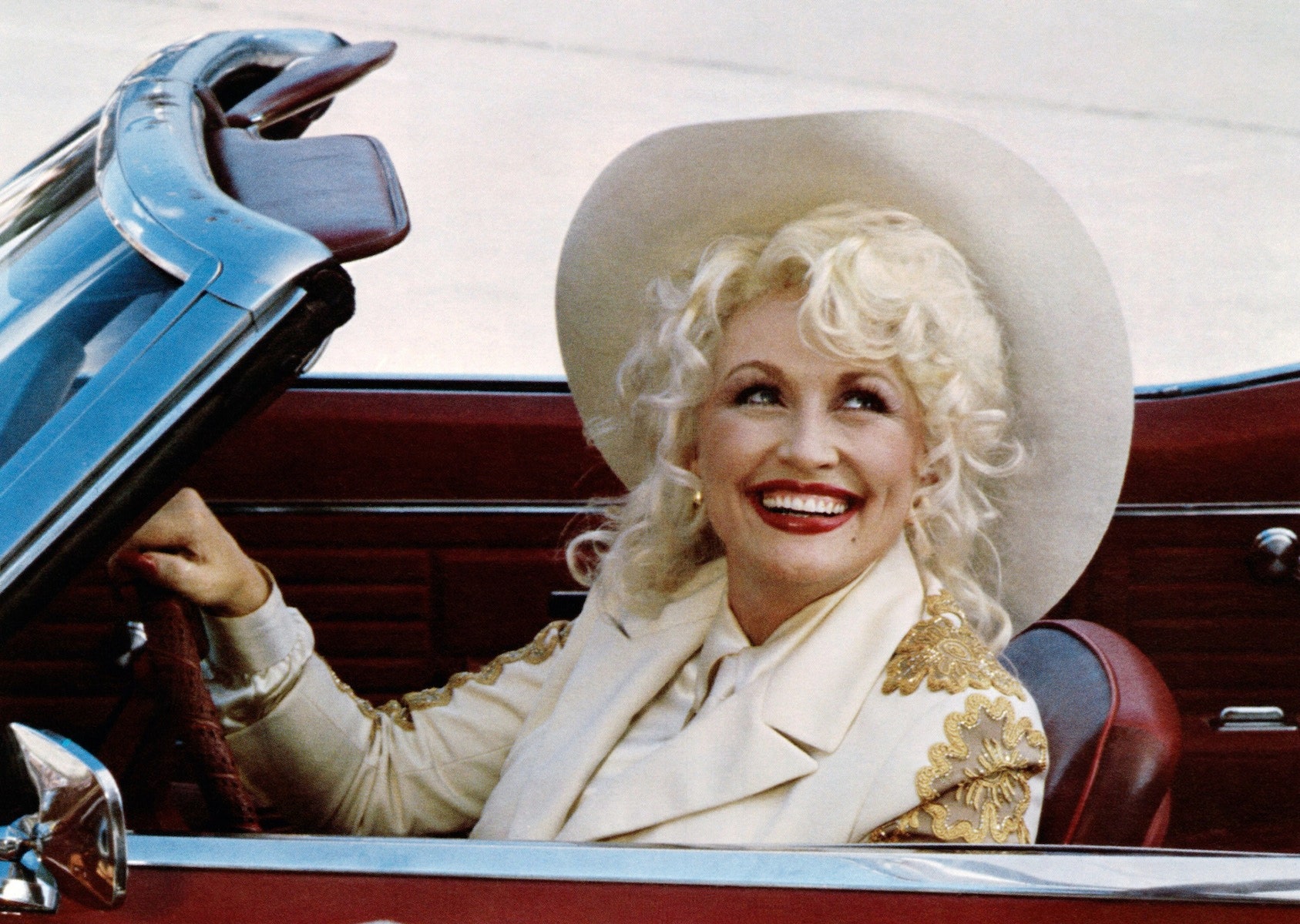 dolly parton photos young Why does everyone love them? See her iconic style from way back then.
