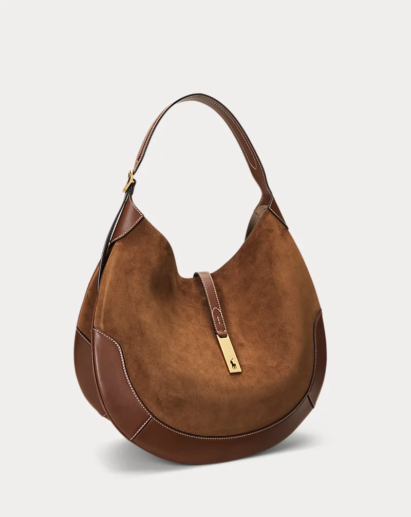 Why is the polo id suede large shoulder bag so popular? Discover its unique design and quality.
