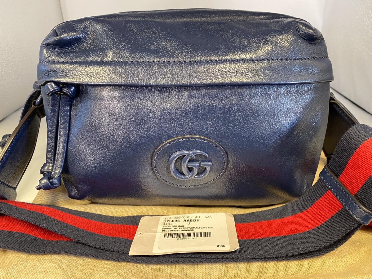 How much is a navy blue gucci purse? Get the real price & shopping tips now!