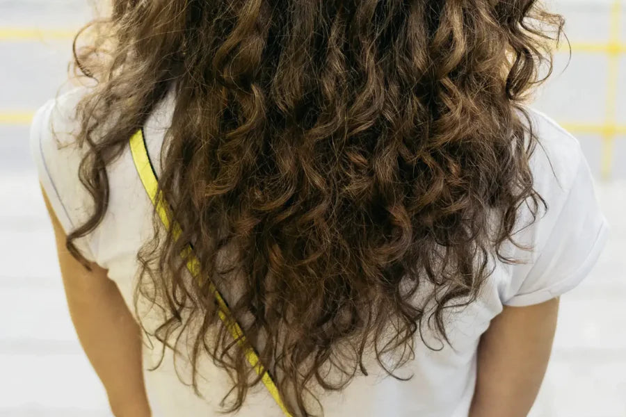 Why women get big hair easy reasons explained for frizzy locks